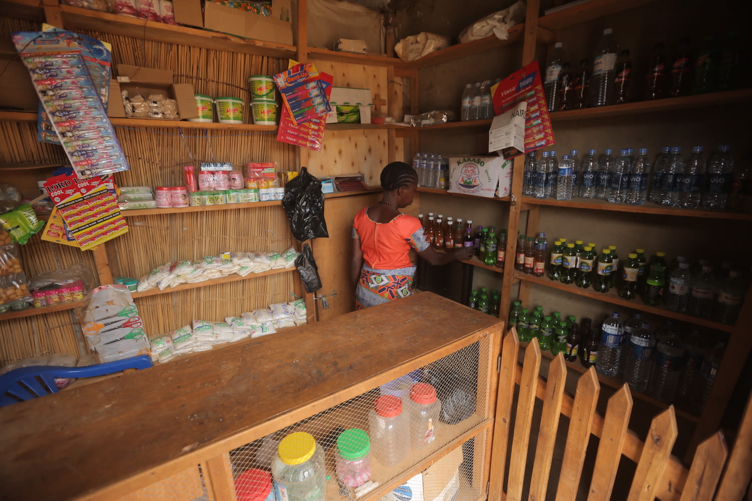 Leoniya in her store in Uganda 